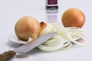 onions-yellow Yellow onions are commonly sliced and served raw.